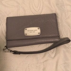 Michael Kors I Phone 6 holder and money clutch